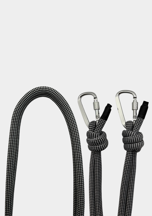 CORREA BLANCO Y NEGRO MOSQUETÓN PLATEADO