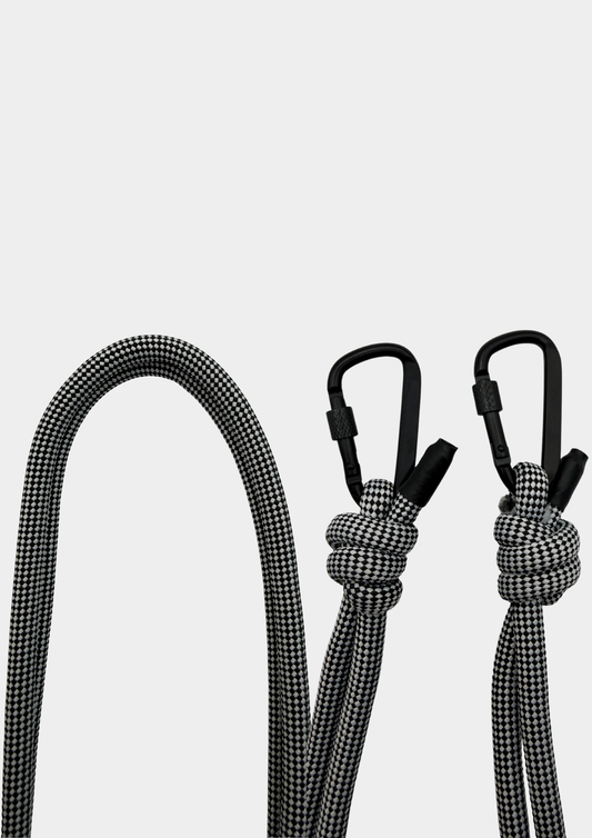 CORREA BLANCO Y NEGRO MOSQUETÓN NEGRO